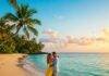 10 Budget-Friendly Honeymoon Beach Destinations You’ll Never Forget Tropical Beach Couple Embrace