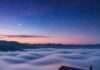 Stay Above the Clouds: Best Mountain Escapes for Your Next Vacation Misty Mountain Cabin at Dawn