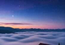 Stay Above the Clouds: Best Mountain Escapes for Your Next Vacation Misty Mountain Cabin at Dawn