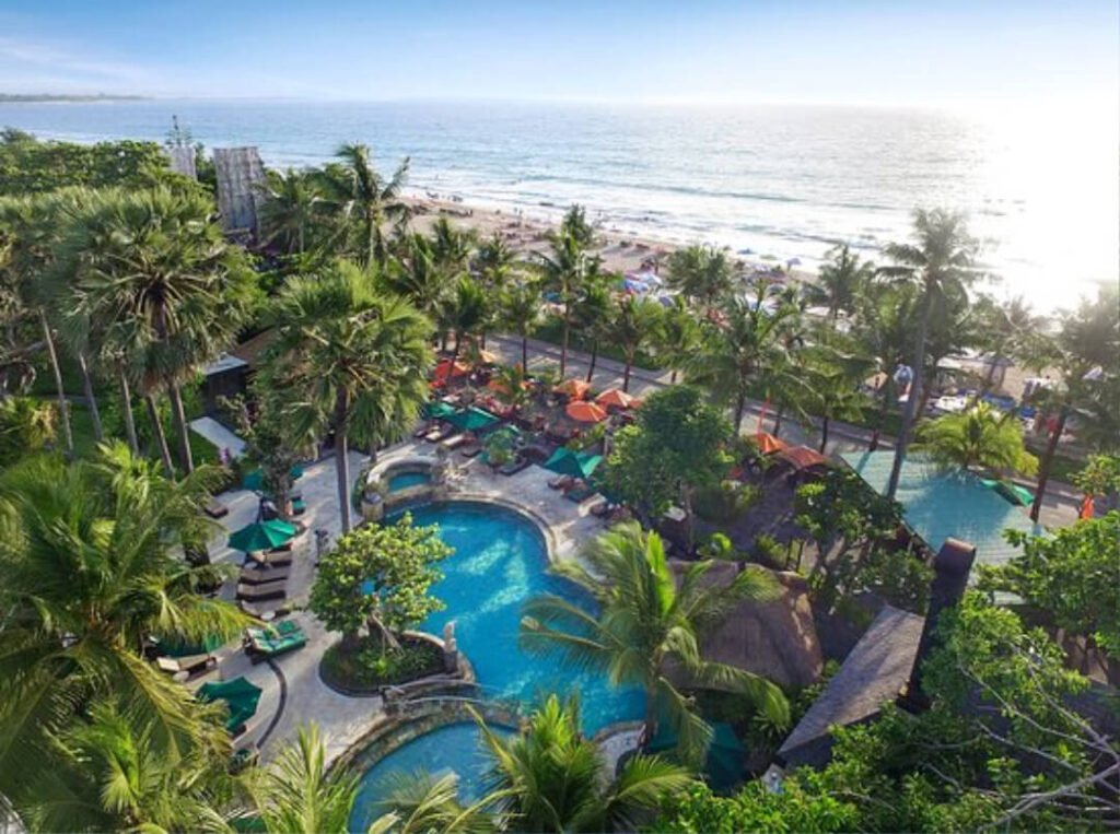 Real-life beachfront access from affordable hotels in Bali, waves included
