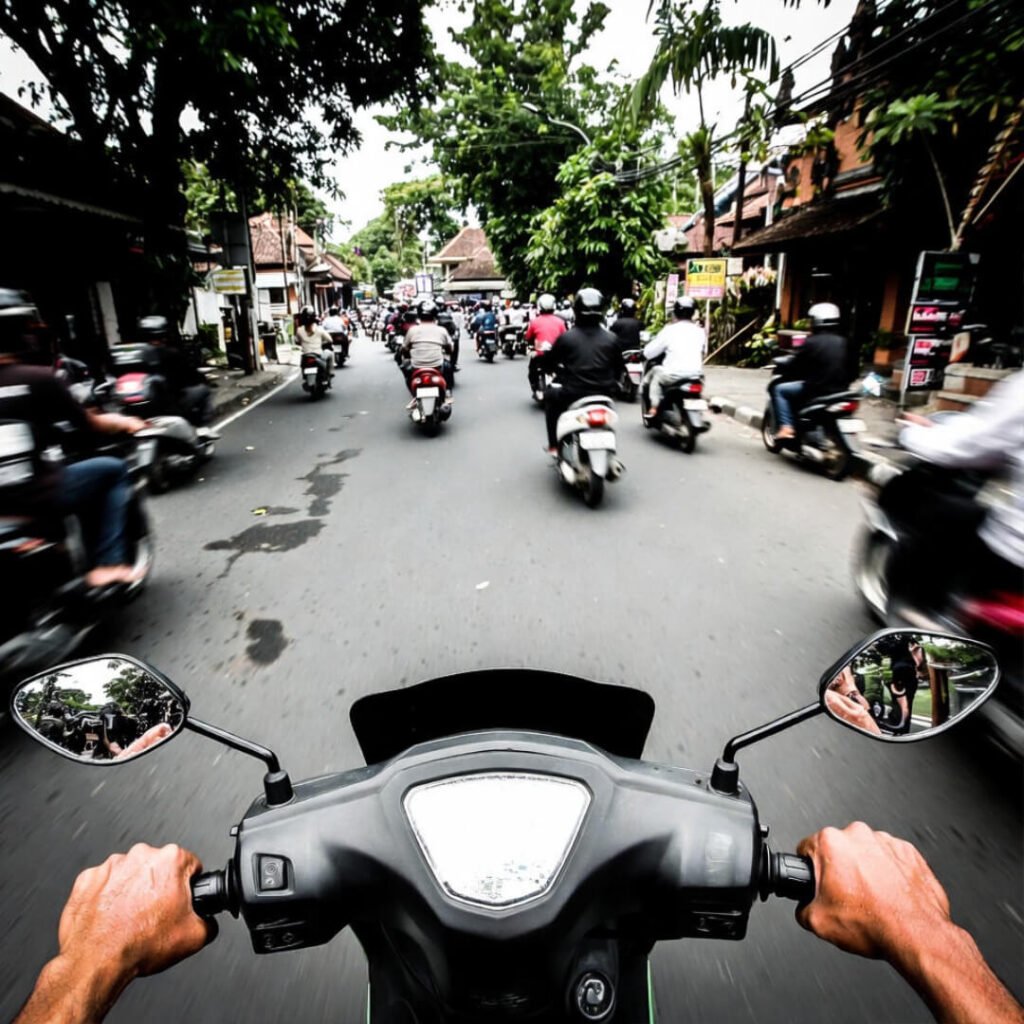 Panicking in chaotic Ubud scooter traffic jam.